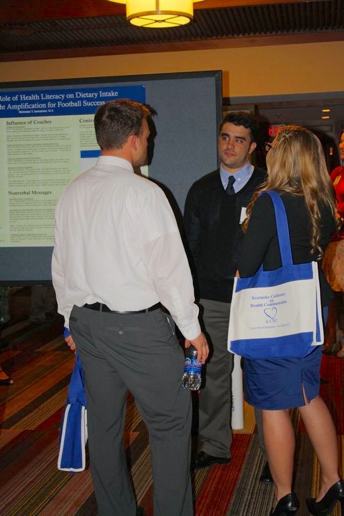 KCHC speakers shaking hands